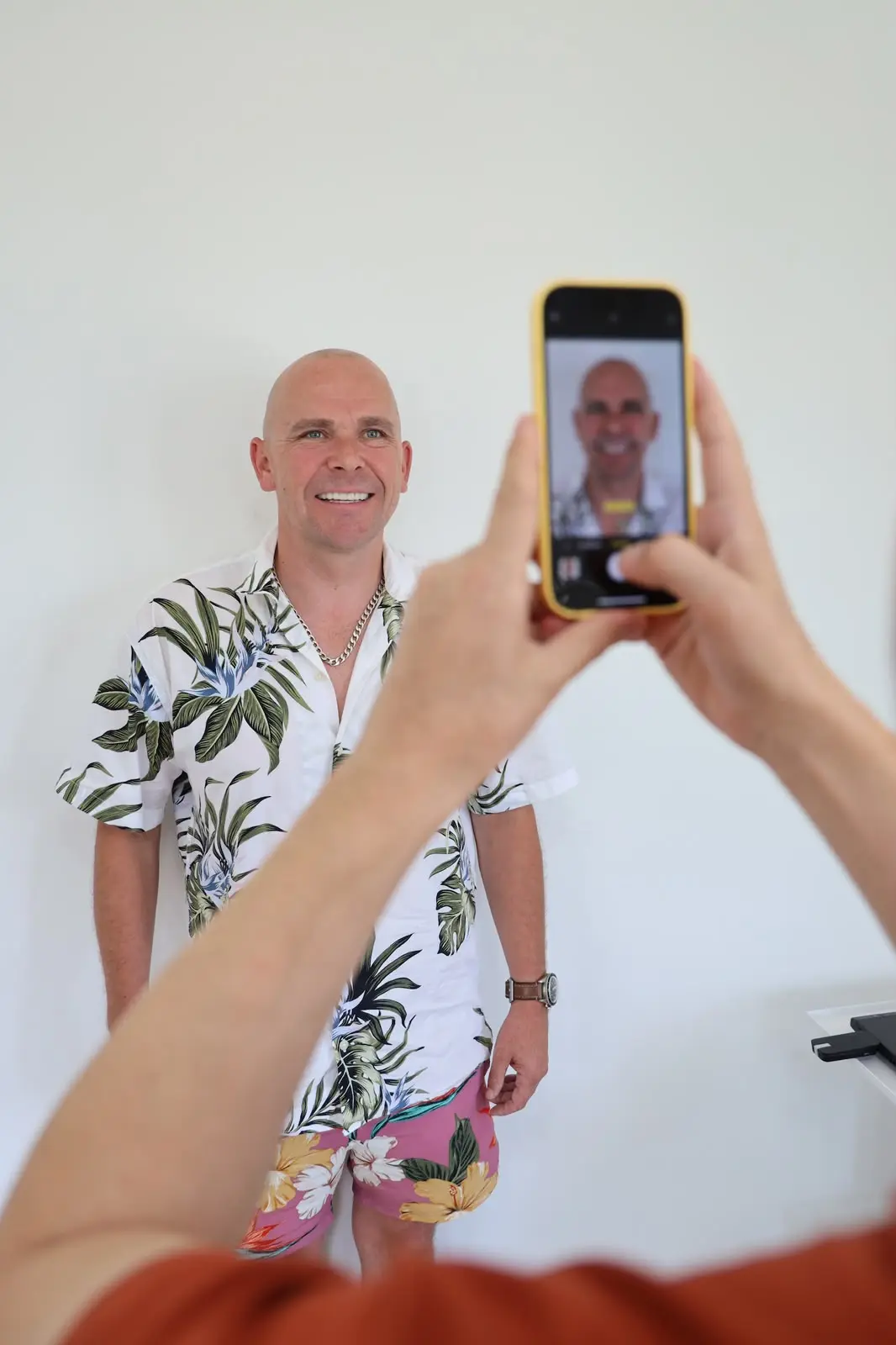 H.S. Dental patient having his smile photographed at the clinic